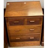 A mid 20th century teak bureau, the fall front ope