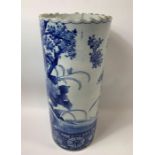 A 20th century Chinese blue and white umbrella sta