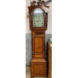 A 19th century oak and mahogany longcase clock with