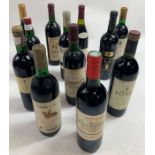 Twelve bottles of vintage and other red wines