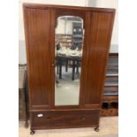 A 20th century mahogany mirrored wardrobe, with a