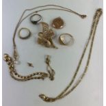A 9 carat gold brooch; a signet ring; a cat penda