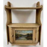 A Victorian pine hanging shelf, the single door pa