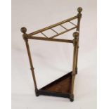 A Victorian brass and iron stick stand, with detac