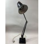 A 20th century two step black anglepoise lamp