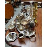 A collection of metal ware including various