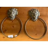 Pair of decorative brass lion face towel holders