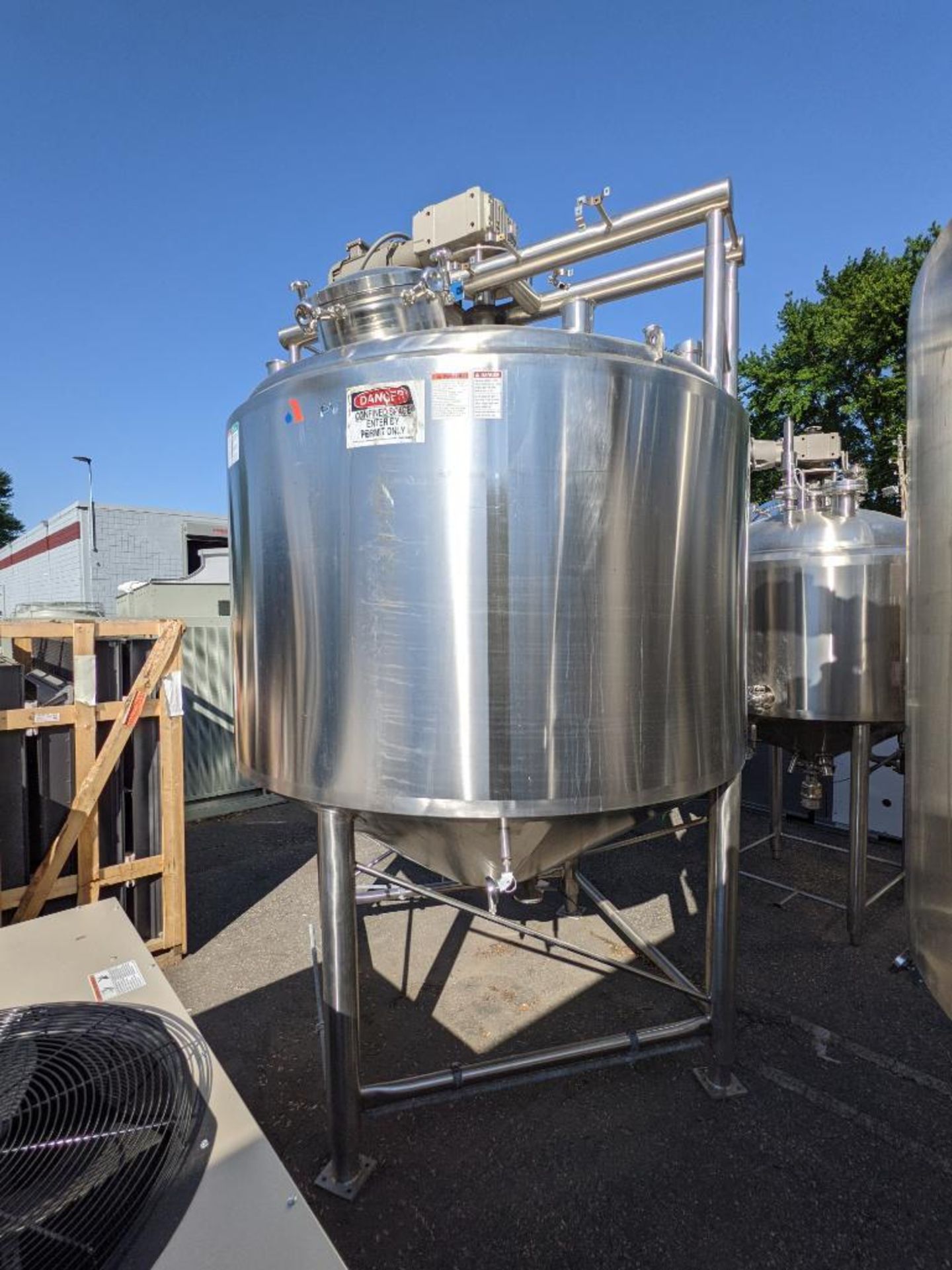 APV 1500 gallon SS Jacketed Tank with top agitation and side sweep