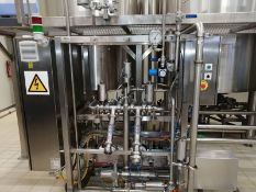 Tetra Pak Dosys System for Fruit Dosing previous filling in Yoghurt Cups