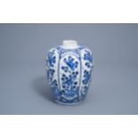 A Dutch Delft blue and white vase with floral design, 18th C.