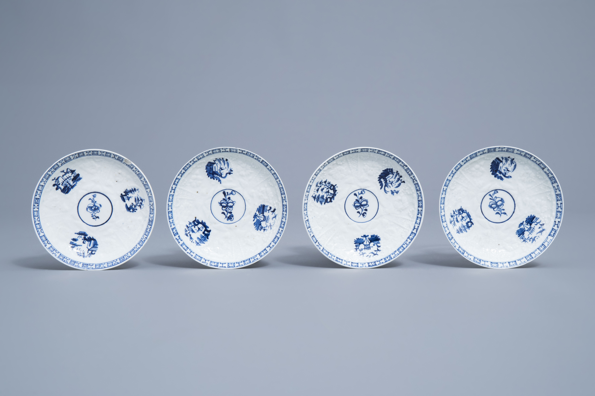 An English 22-piece blue and white Lowestoft creamware 'Hughes' coffee and tea service, 18th C. - Image 3 of 38