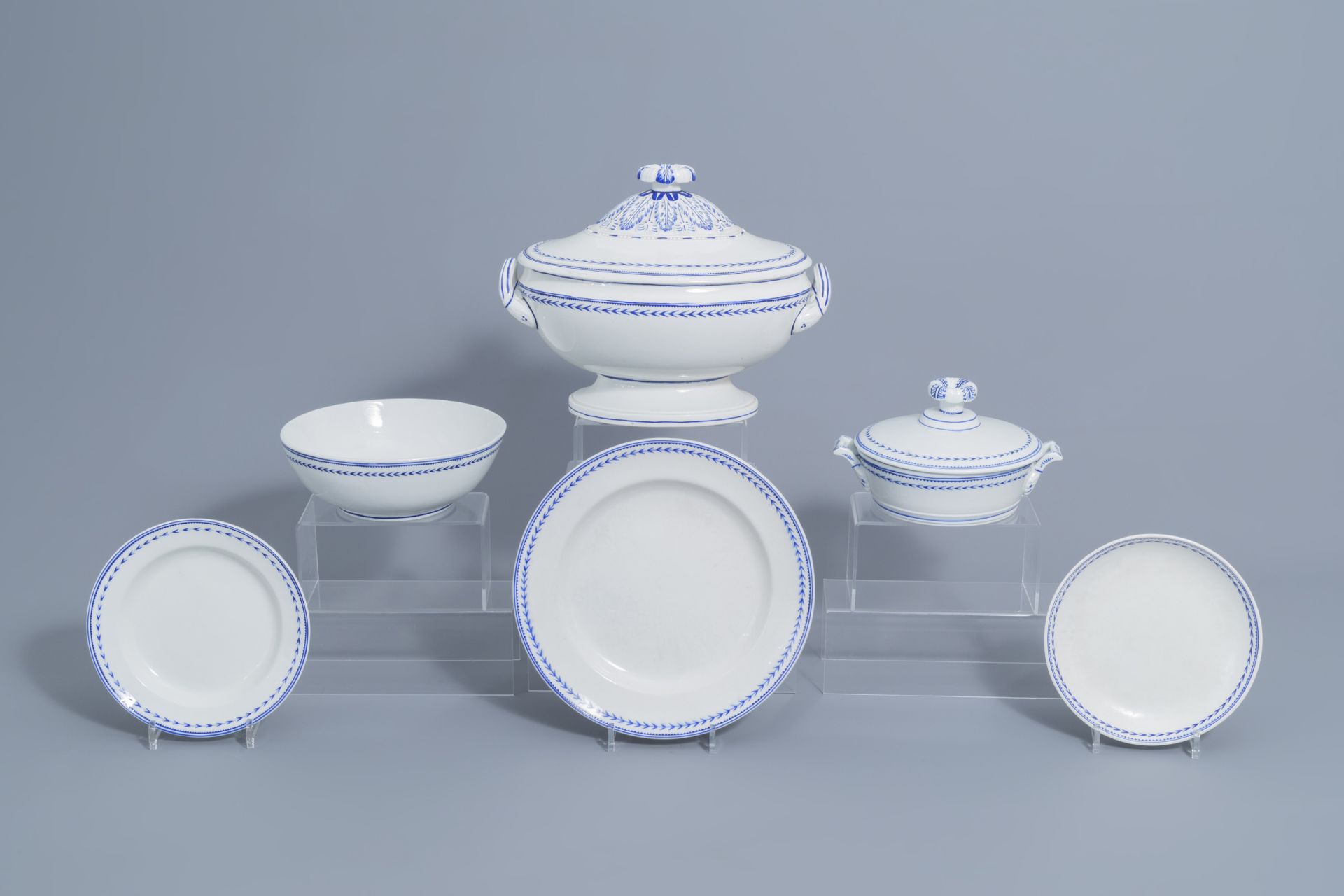 A 75-piece blue and white Tournai porcelain part service, 19th C. - Image 4 of 16