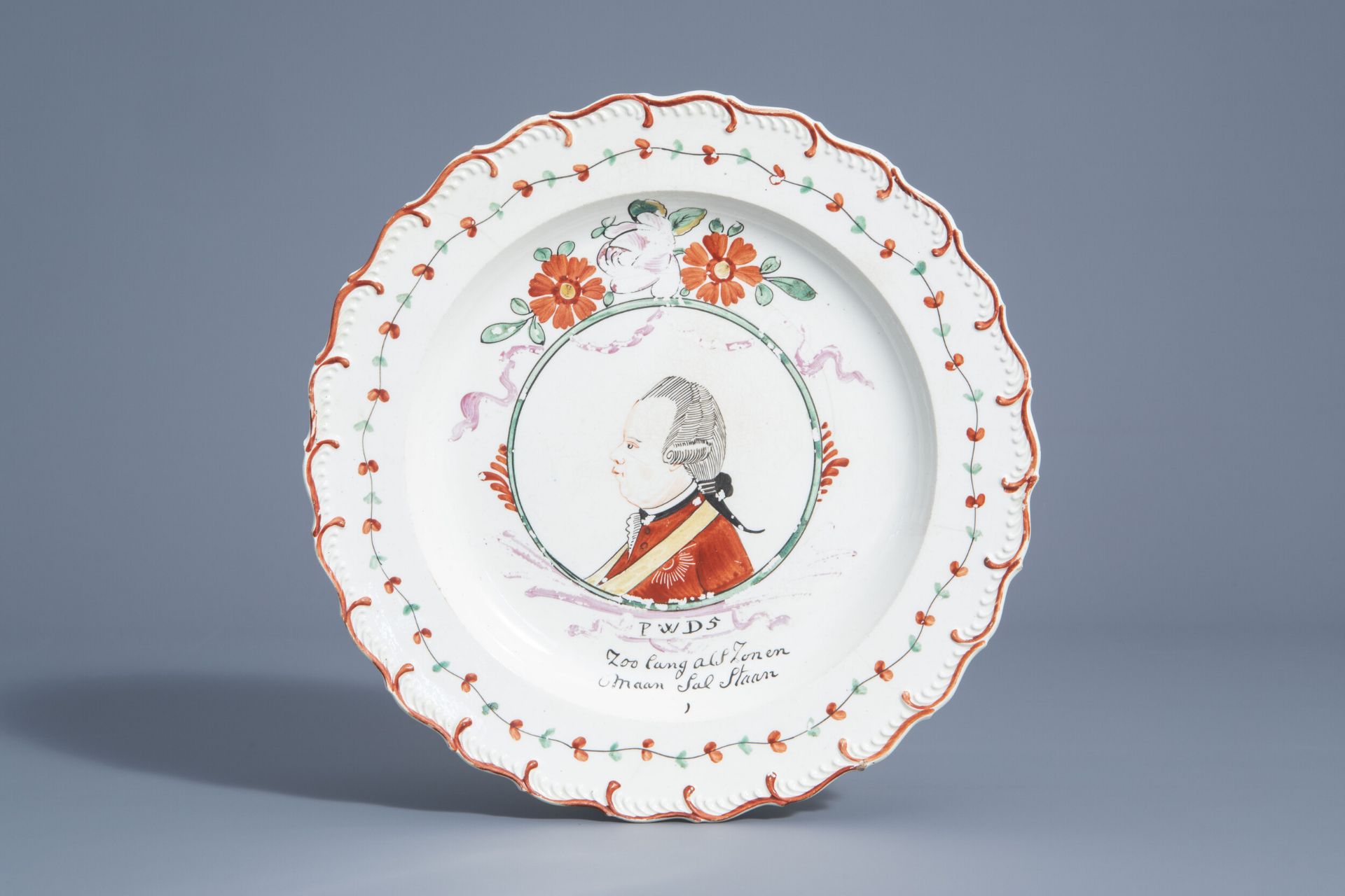 A Dutch decorated English creamware orangist portrait plate, 18th C.