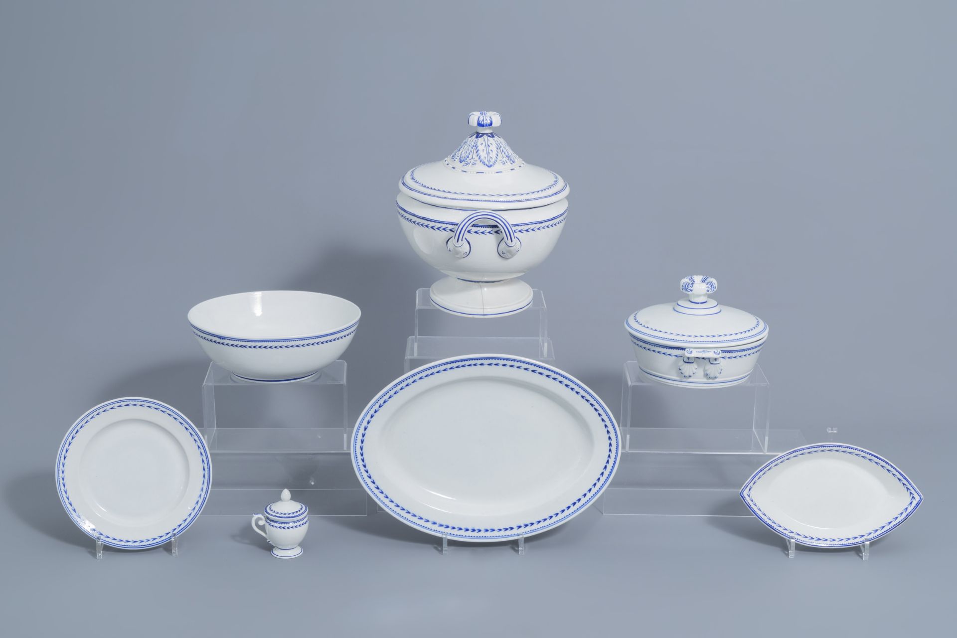 A 75-piece blue and white Tournai porcelain part service, 19th C. - Image 7 of 16