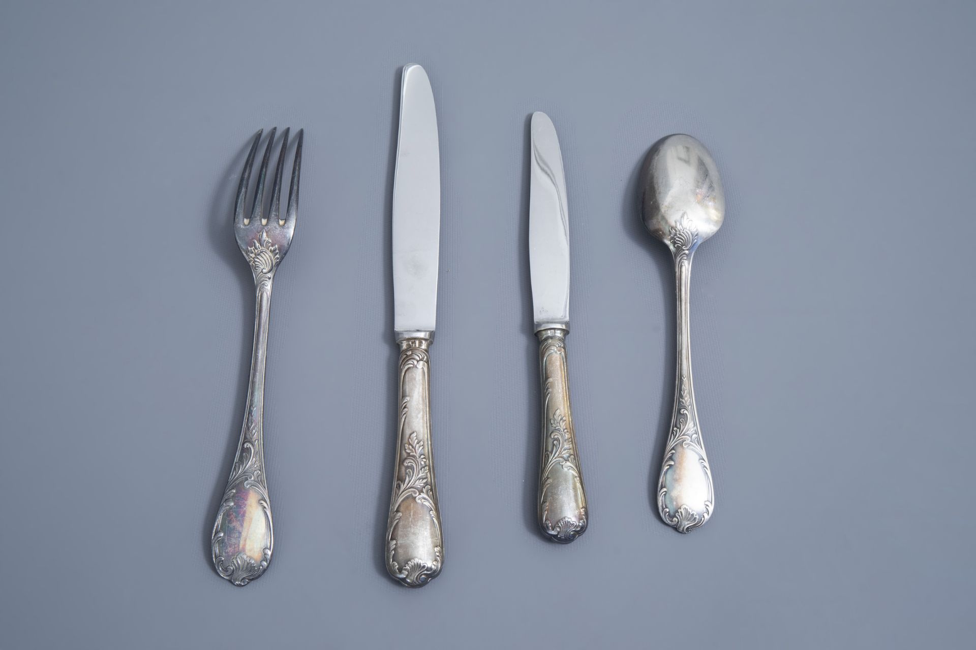 A French 65-piece silver plated rococo style cutlery set, model Marly, Christofle, 20th C. - Image 5 of 32