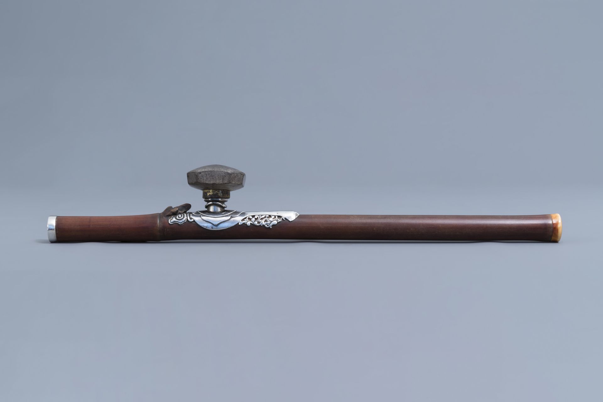 A Chinese bamboo opium pipe with silver saddle, ivory mouthpiece and stoneware damper, 19th C. - Image 3 of 10
