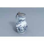 A Dutch Delft blue and white 'chinoiserie' jug with pewter cover, 17th C.