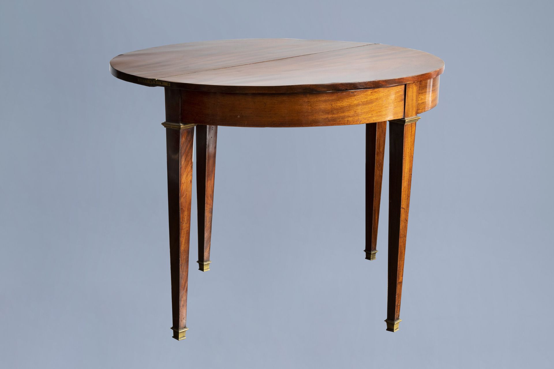 A French Directoire wood 'demi lune' console table, ca. 1800