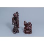 Two Chinese wooden figures of Shou Lao and a laughing Buddha, 19th/20th C.