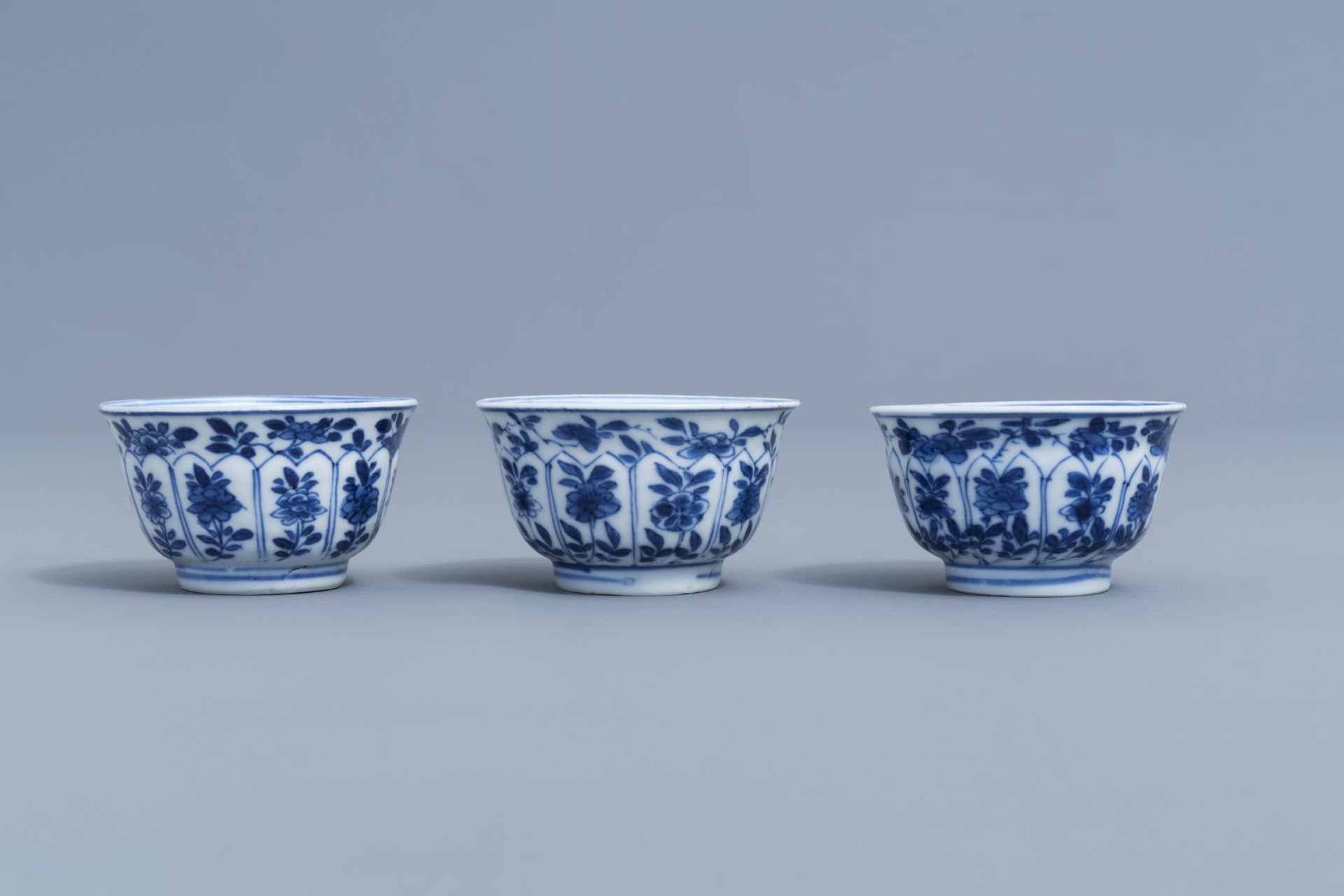 Three Chinese blue and white cups and saucers with floral design, Kangxi - Image 5 of 9