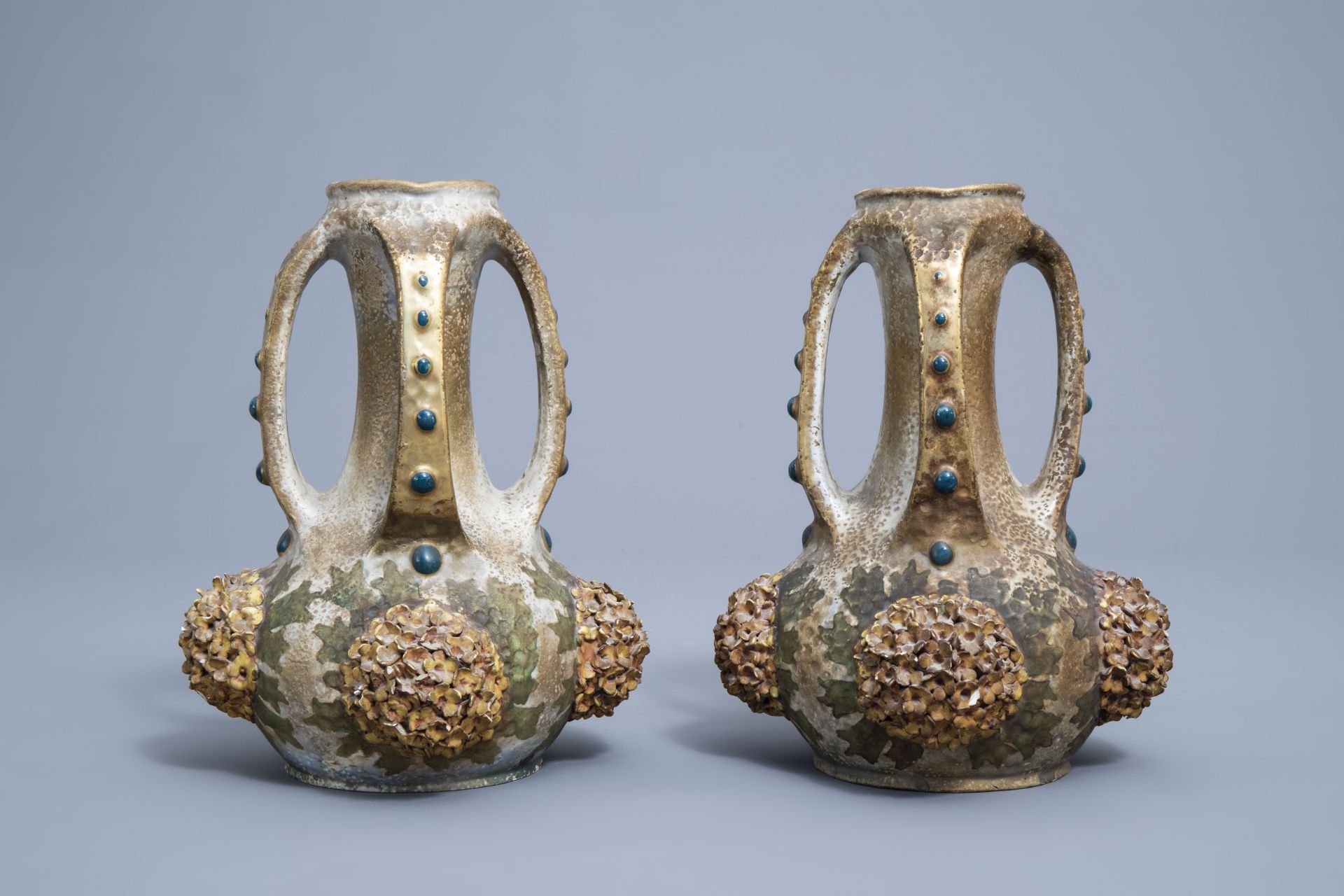 A pair of polychrome, gilt and iridescent Amphora Austria Art Nouveau vases, early 20th C. - Image 8 of 20