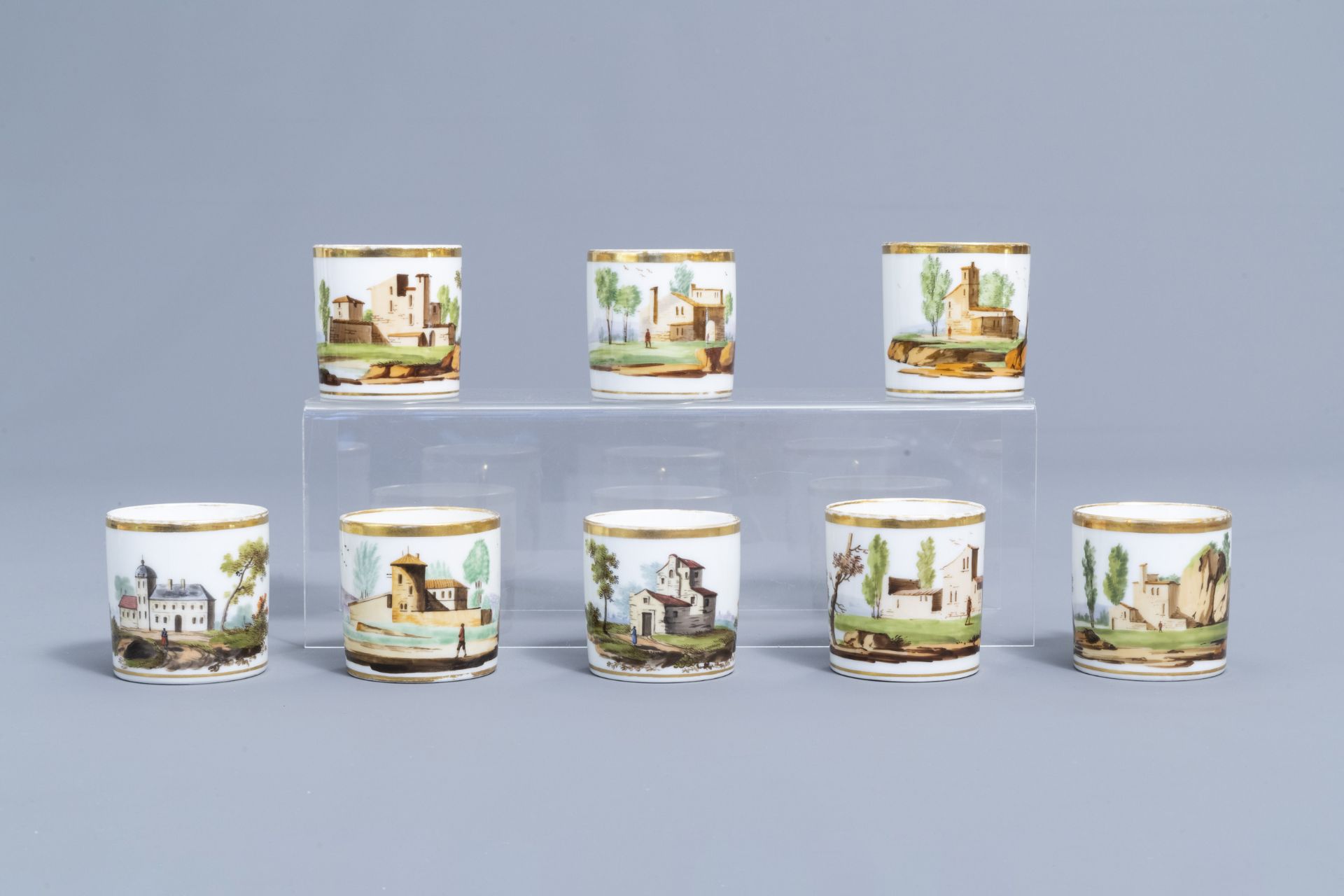 A 21-piece Paris polychrome and gilt porcelain coffee and tea service with landscapes, 19th C. - Image 35 of 46