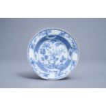 A Chinese blue and white deep plate with floral design, Yongzheng