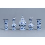 A five-piece Dutch Delft blue and white garniture with floral design, 18th C.