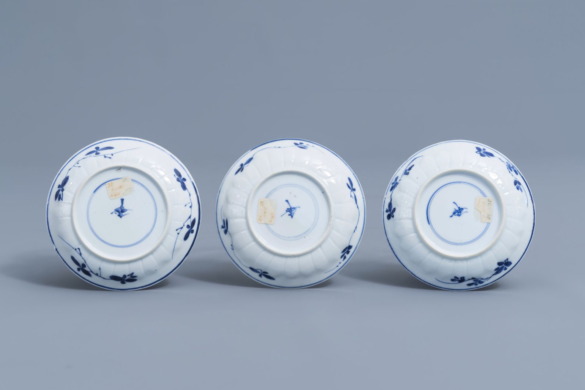 Three Chinese blue and white cups and saucers with floral design, Kangxi - Image 3 of 9