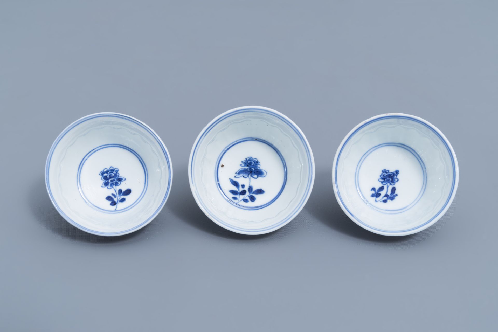 Three Chinese blue and white cups and saucers with floral design, Kangxi - Image 9 of 9