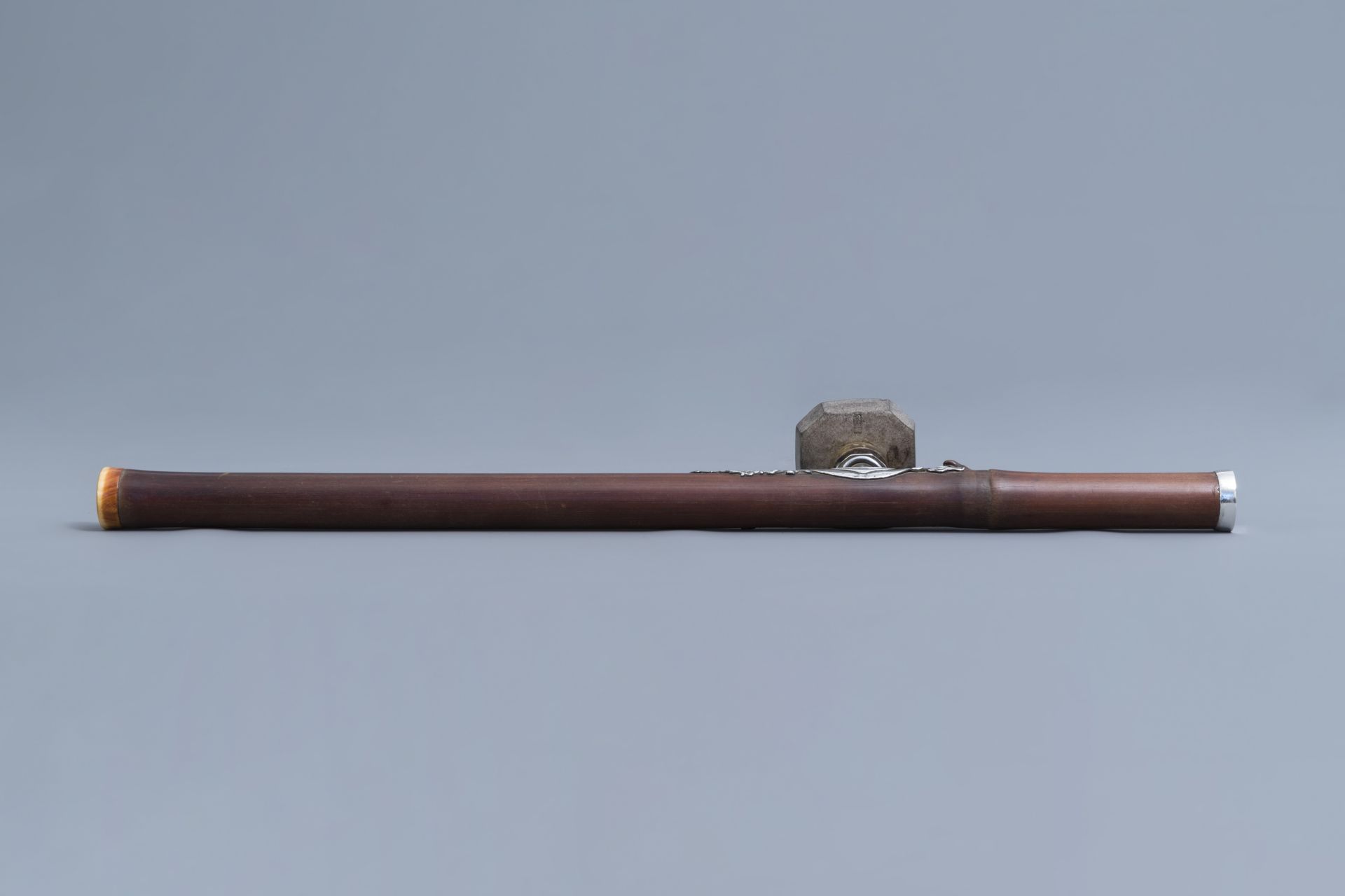 A Chinese bamboo opium pipe with silver saddle, ivory mouthpiece and stoneware damper, 19th C. - Image 6 of 10