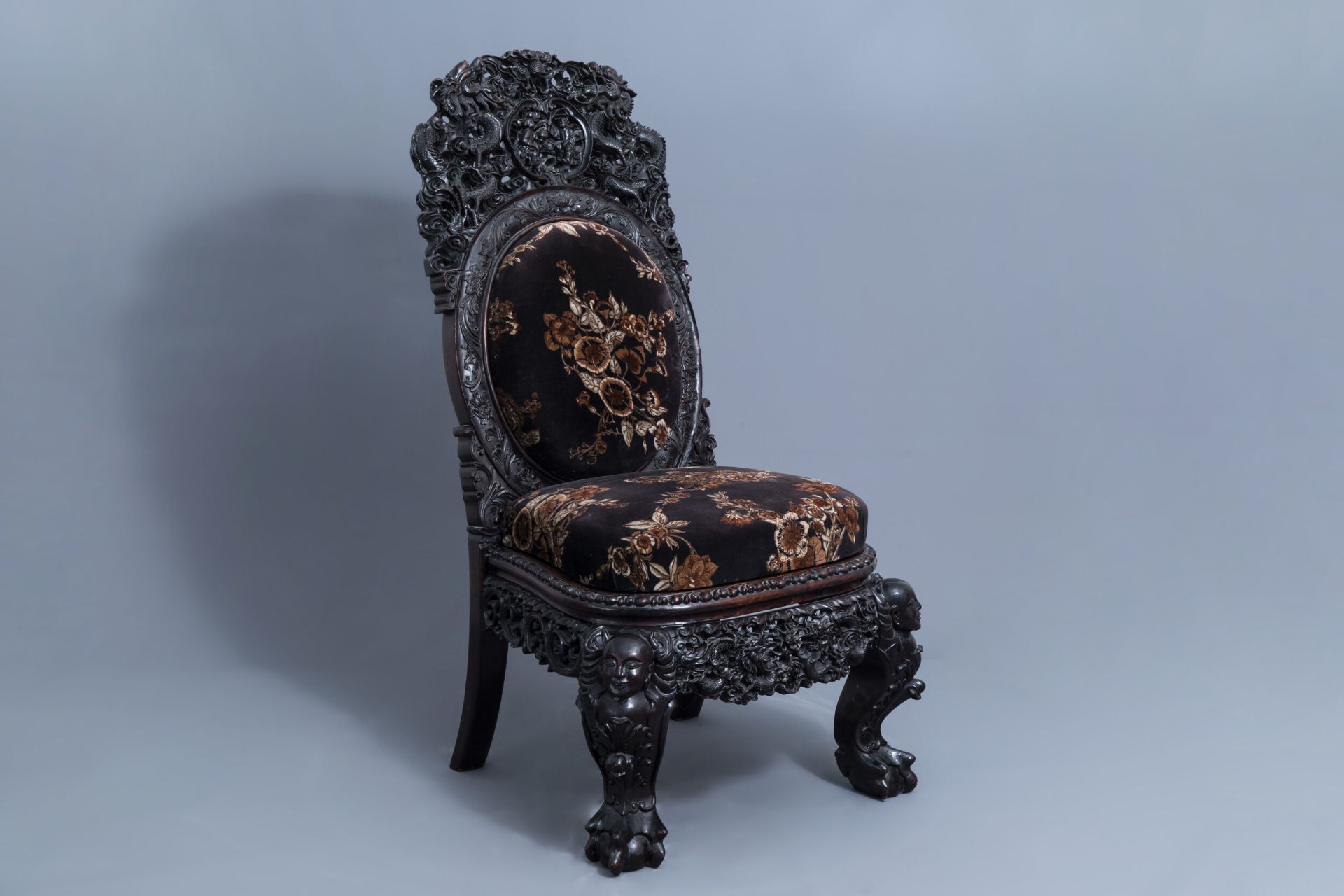 A Chinese finely carved wooden chair, 19th C.