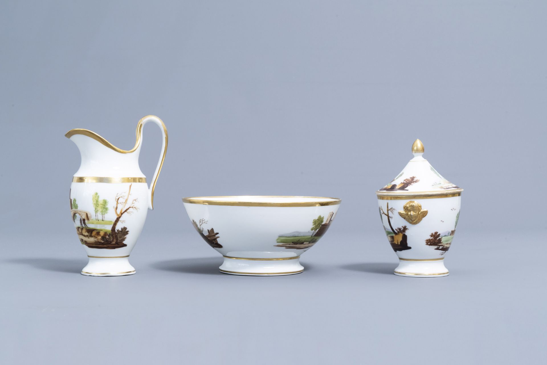 A 21-piece Paris polychrome and gilt porcelain coffee and tea service with landscapes, 19th C. - Image 22 of 46