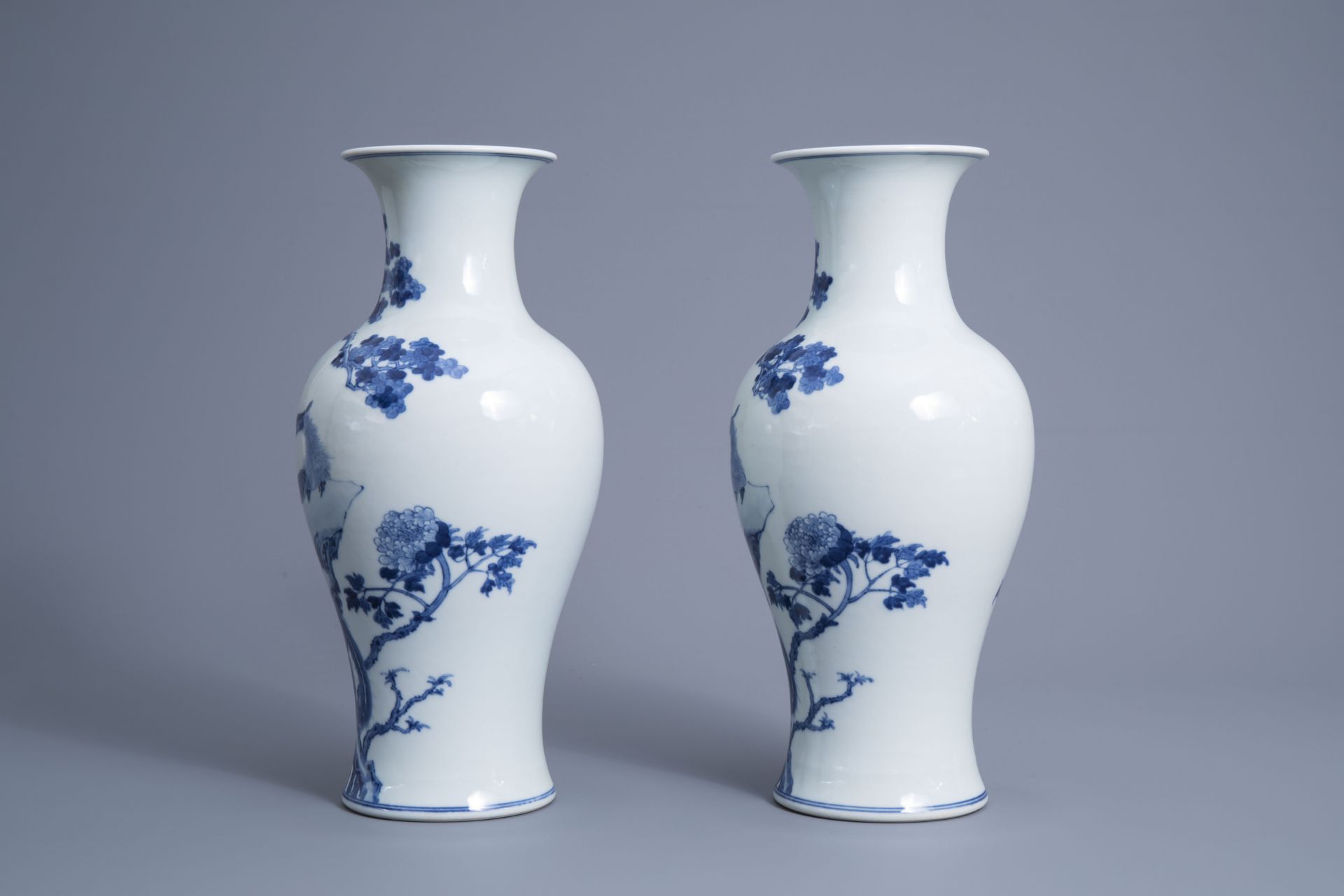 A pair of Chinese blue and white 'phoenix' vases, Republic, 20th C. - Image 4 of 6