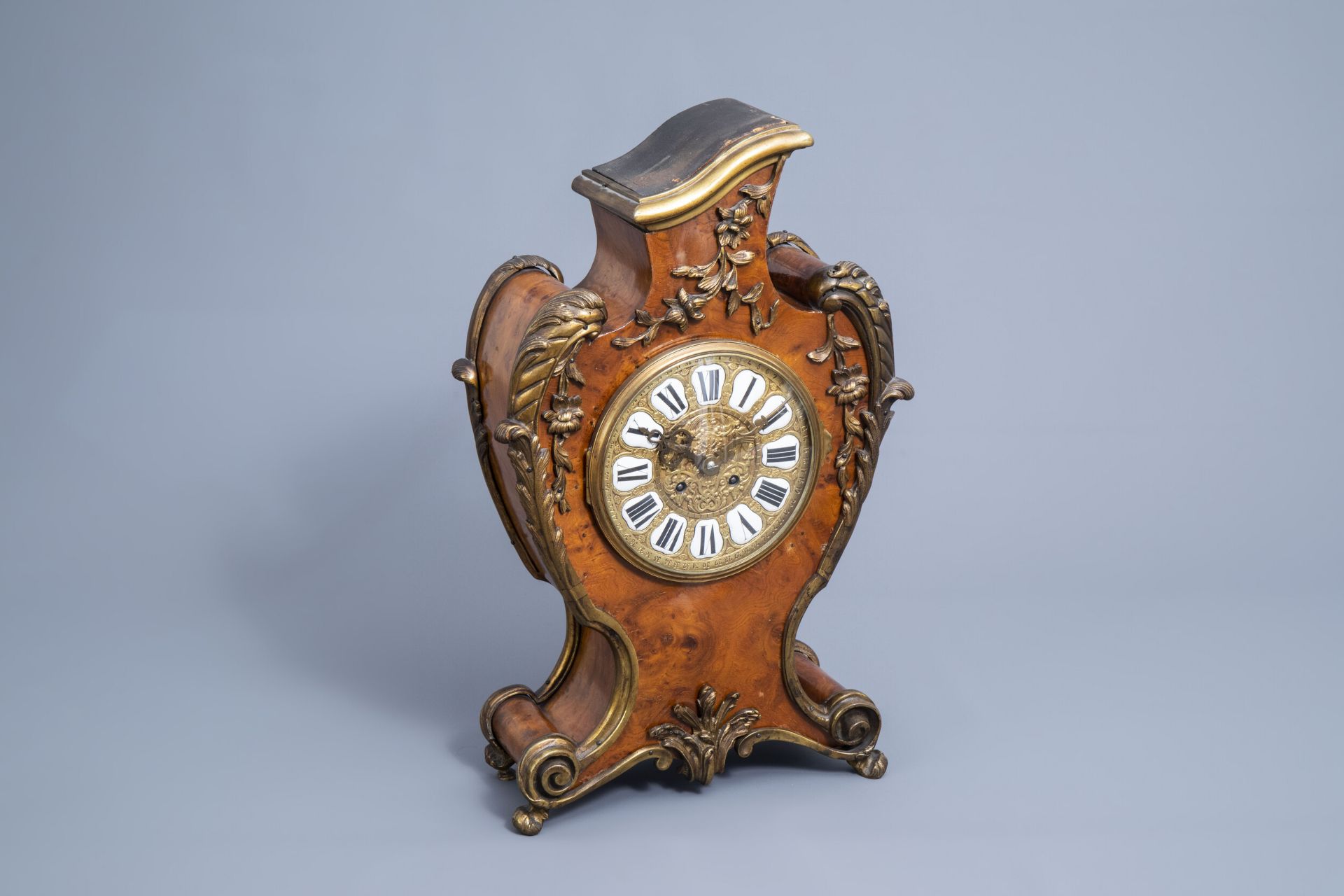 A German burl wood veneered brass mounted Louis XV style cartel clock, , 20th C.