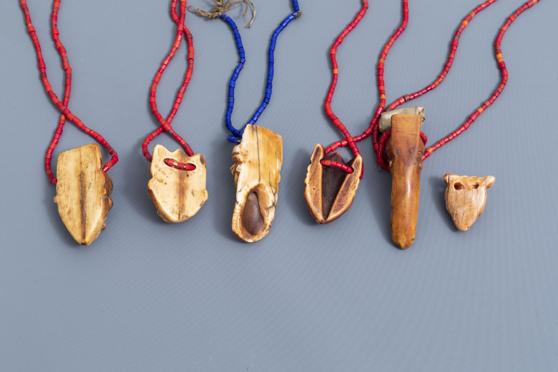 Six ivory Ikhoko pendants, Pende, Congo and a terracotta sculpture, Bura, Niger, 20th C. - Image 9 of 10