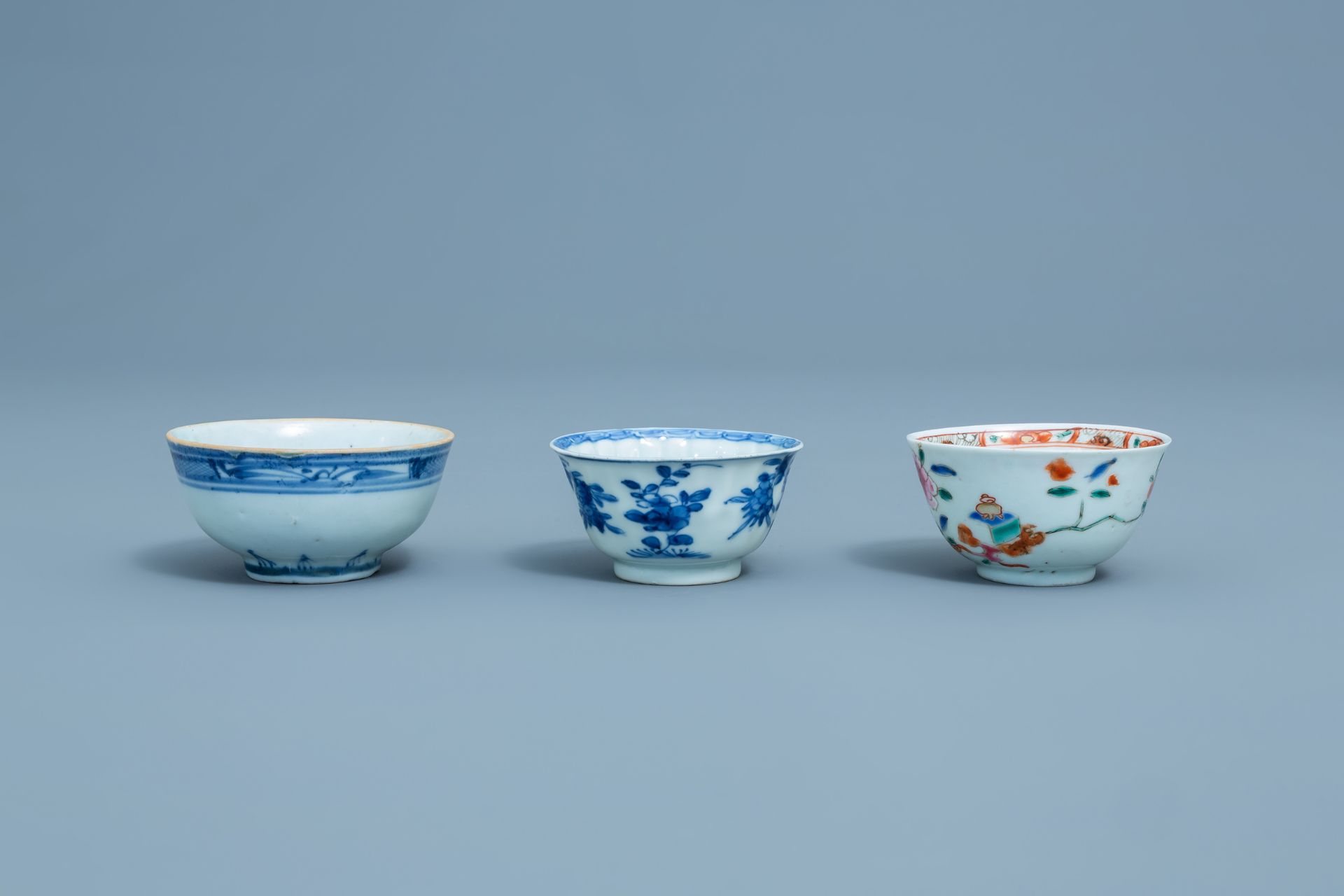 Three Chinese blue, white and famille rose cups and three saucers, Kangxi and later - Image 13 of 18