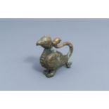 A Chinese partly gilt jade or hardstone bird, 19th/20th C.