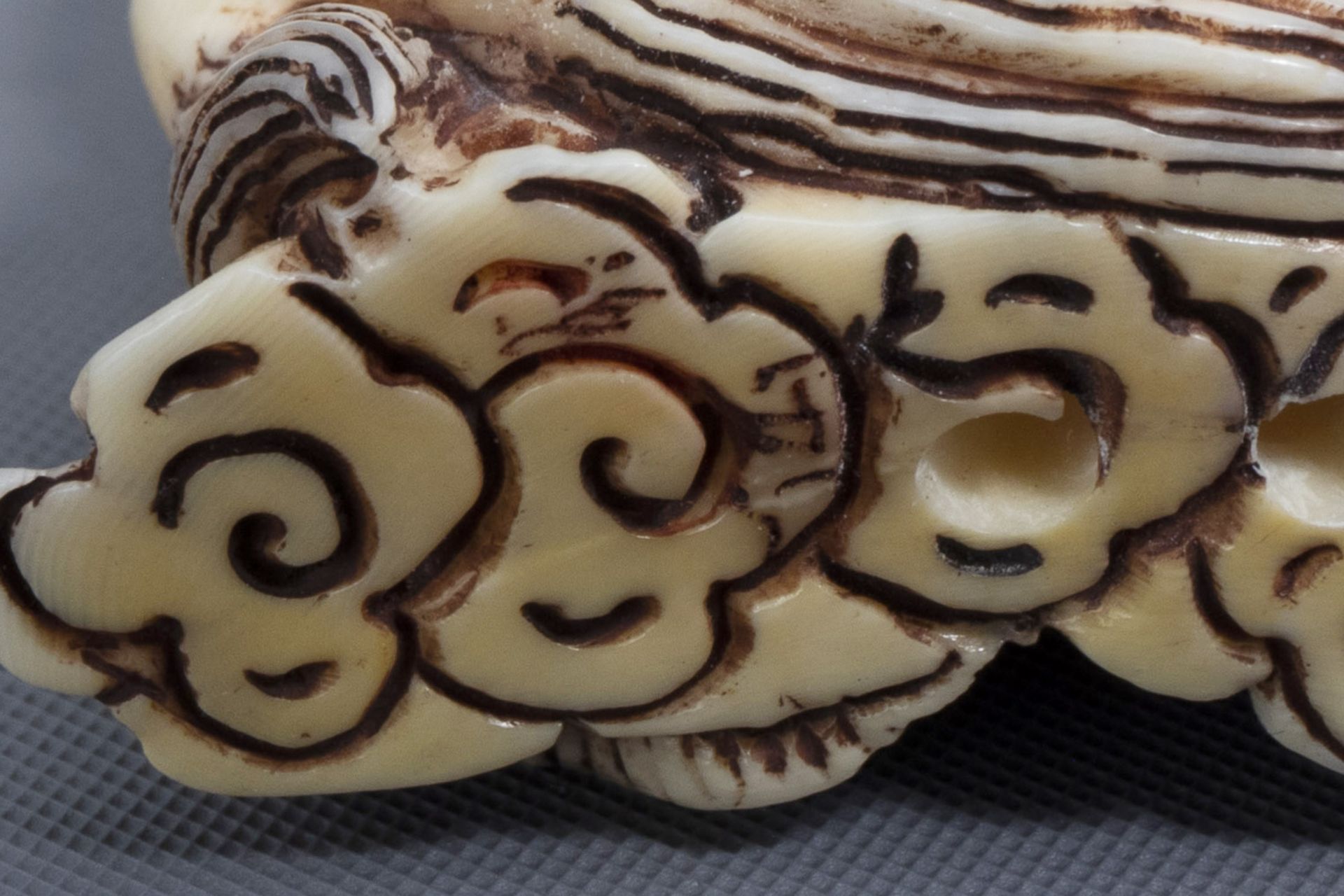 Twelve Japanese animal shaped netsuke in their display cabinet, first half of the 20th C. - Image 11 of 27