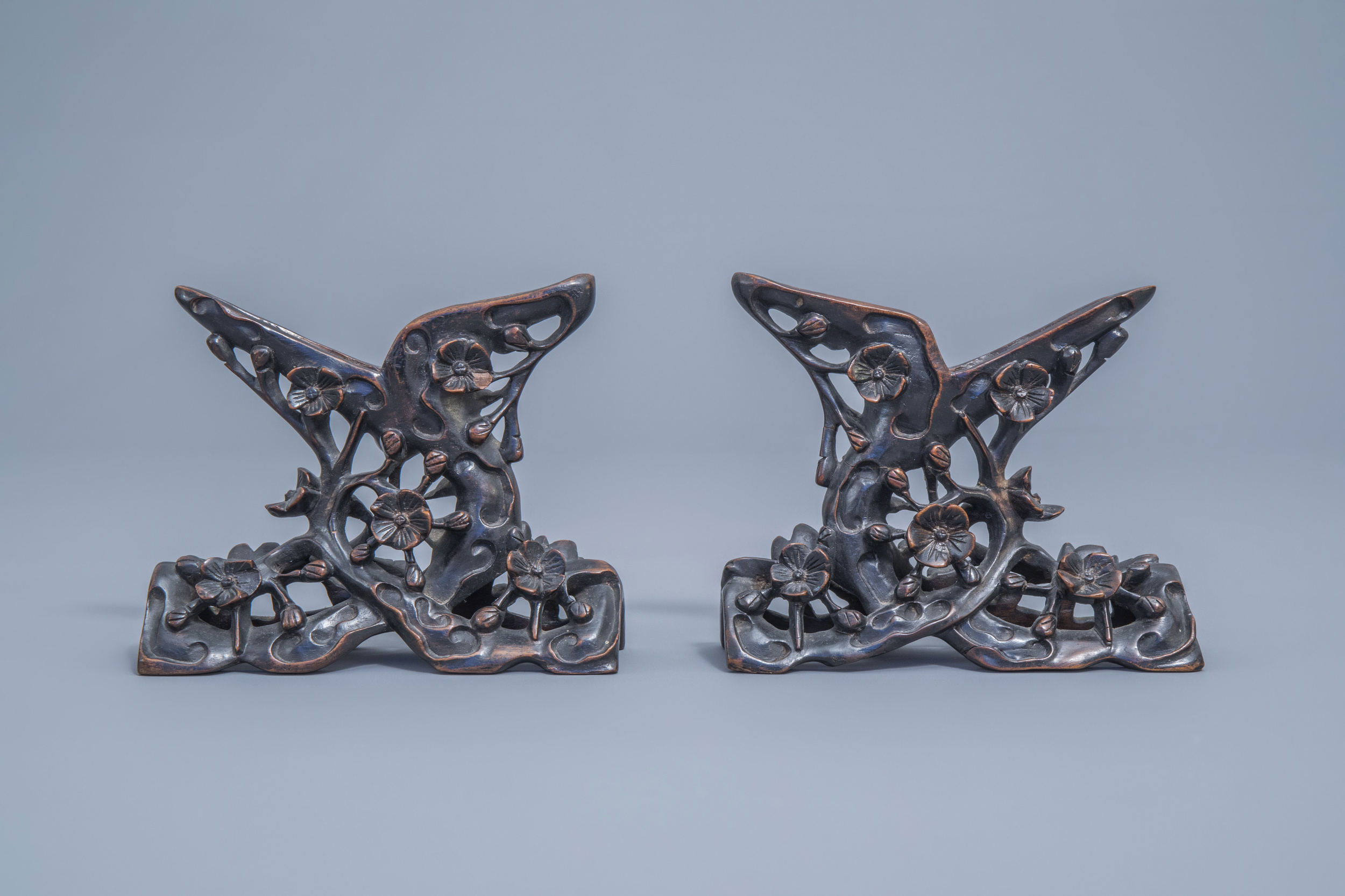 A pair of Chinese carved mother-of-pearl shells on wooden stands, 19th C. - Image 2 of 11