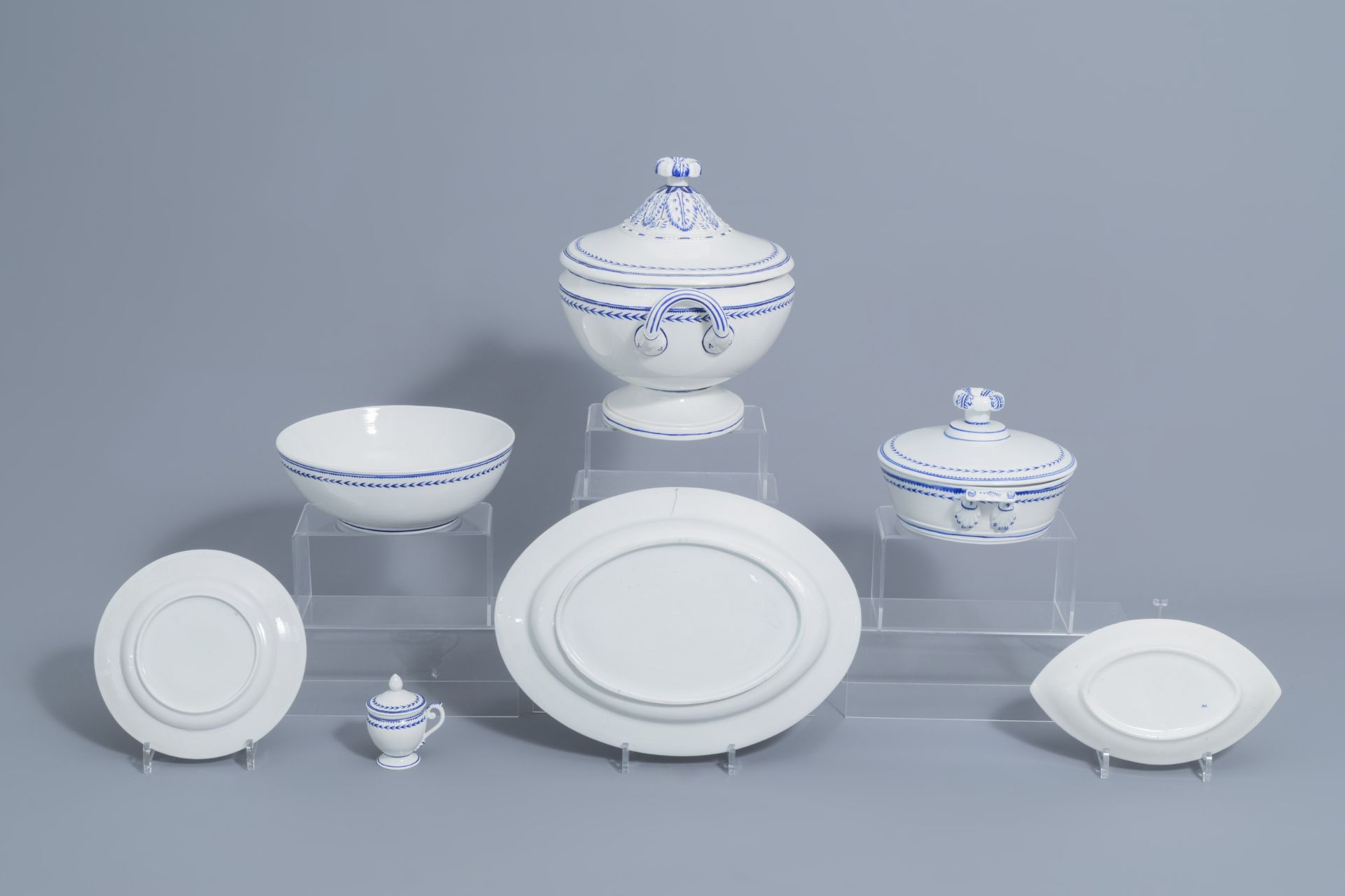 A 75-piece blue and white Tournai porcelain part service, 19th C. - Image 9 of 16