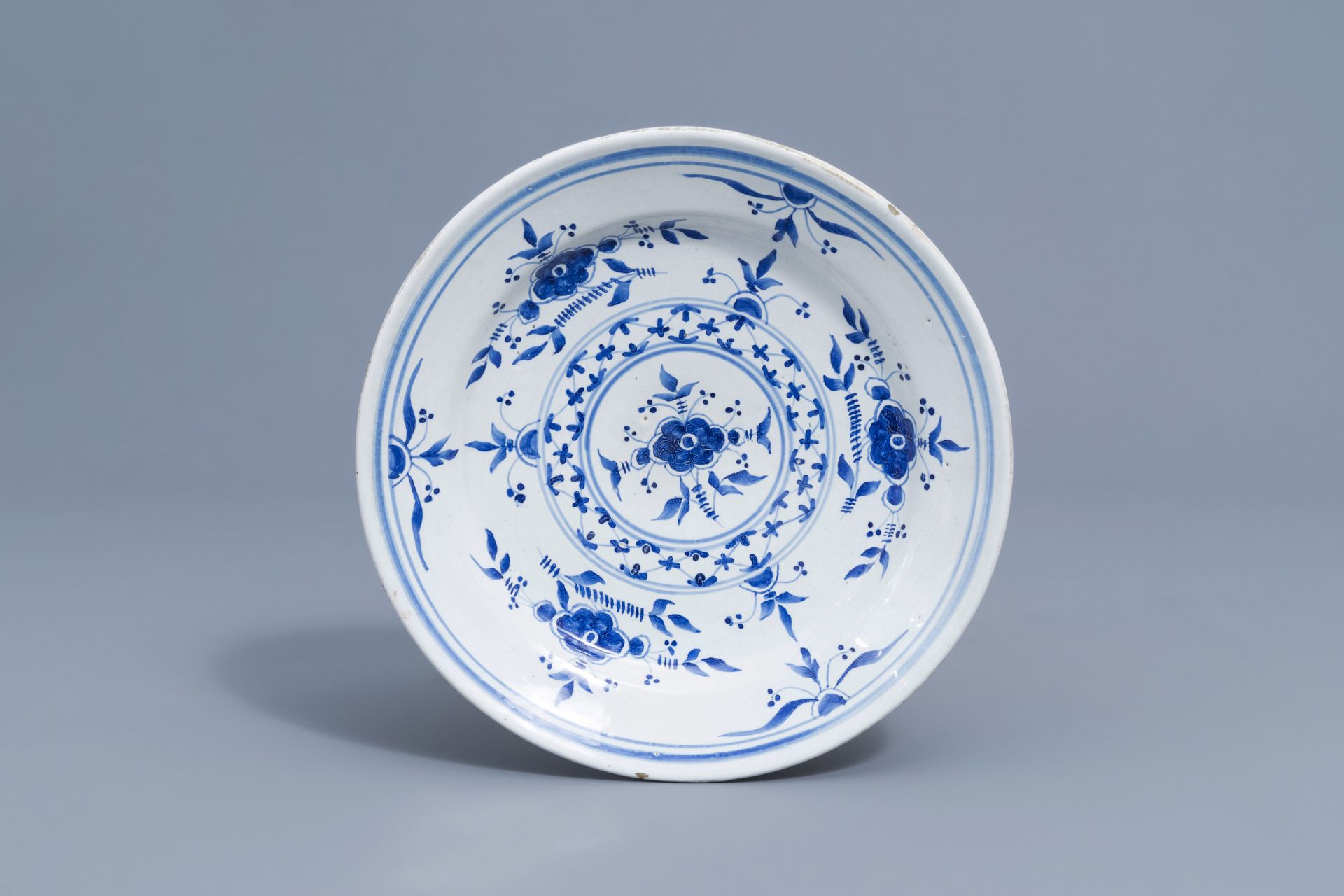 Two blue and white Brussels faience plates and a beer mug, 19th C. - Image 9 of 28