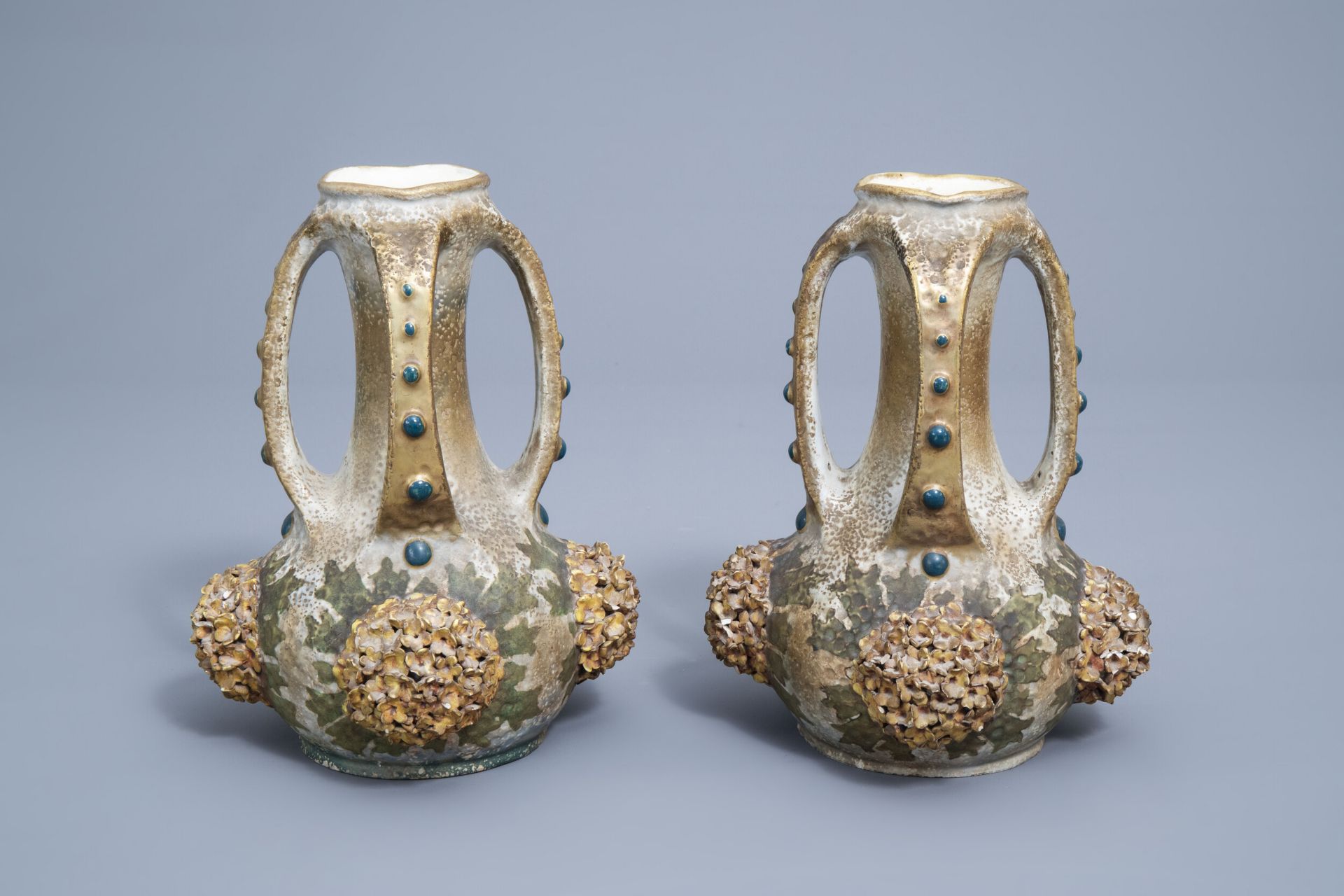 A pair of polychrome, gilt and iridescent Amphora Austria Art Nouveau vases, early 20th C. - Image 2 of 20