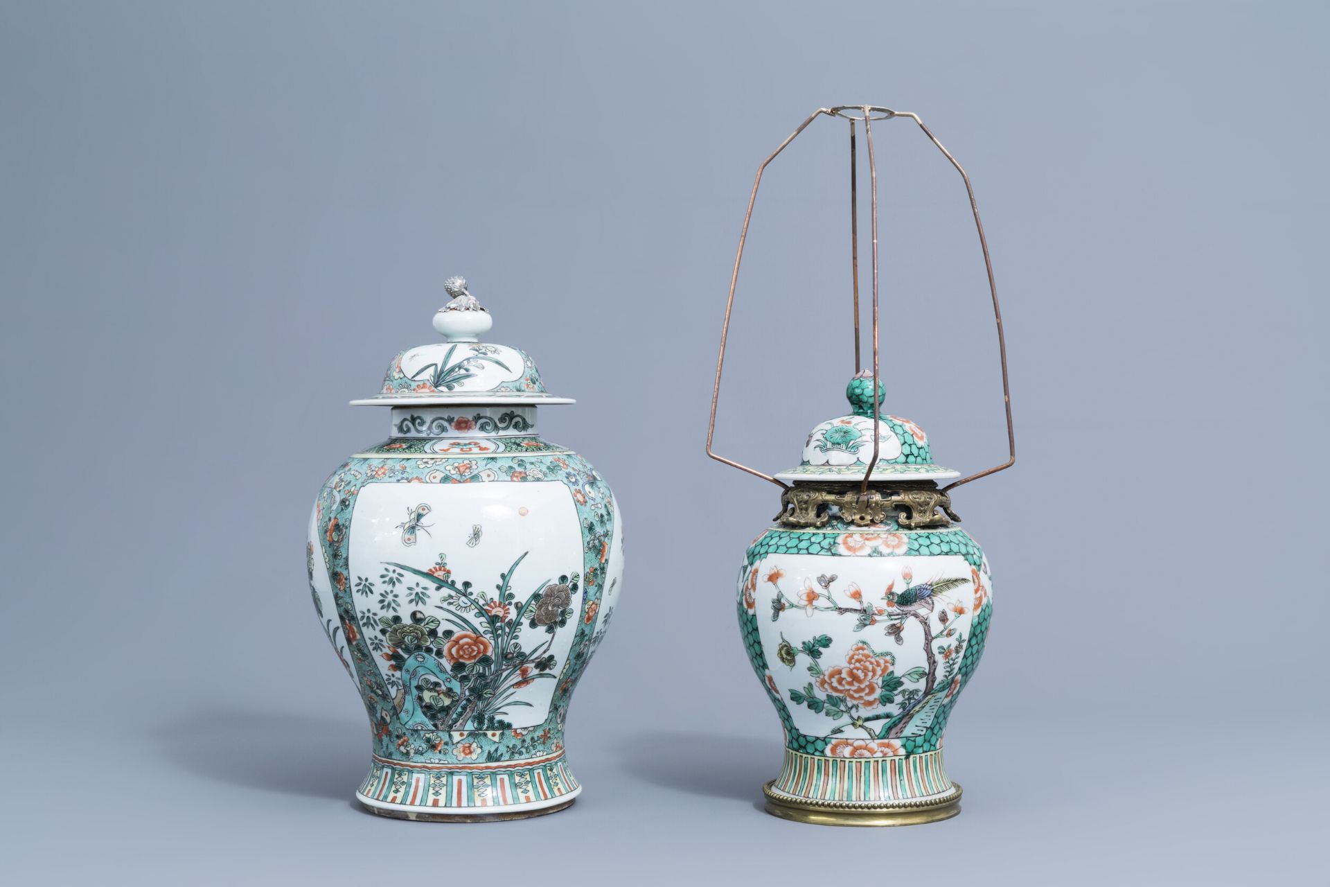 Two Cinese famille verte vases and covers with birds and butterflies, 19th/20th C.
