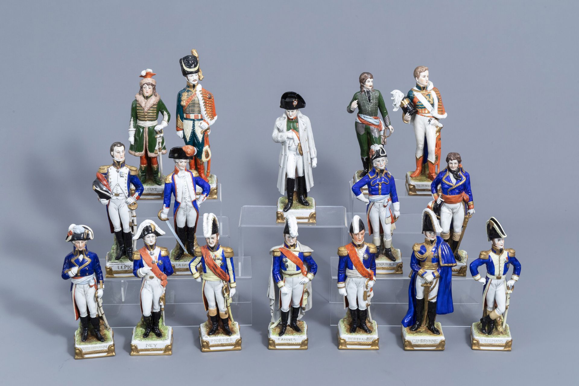 Sixteen figures from Napoleon's army in polychrome Saxon porcelain, Scheibe-Alsbach mark, 20th C.