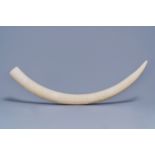 A carved ivory tusk with ornamental design, first half 20th C.