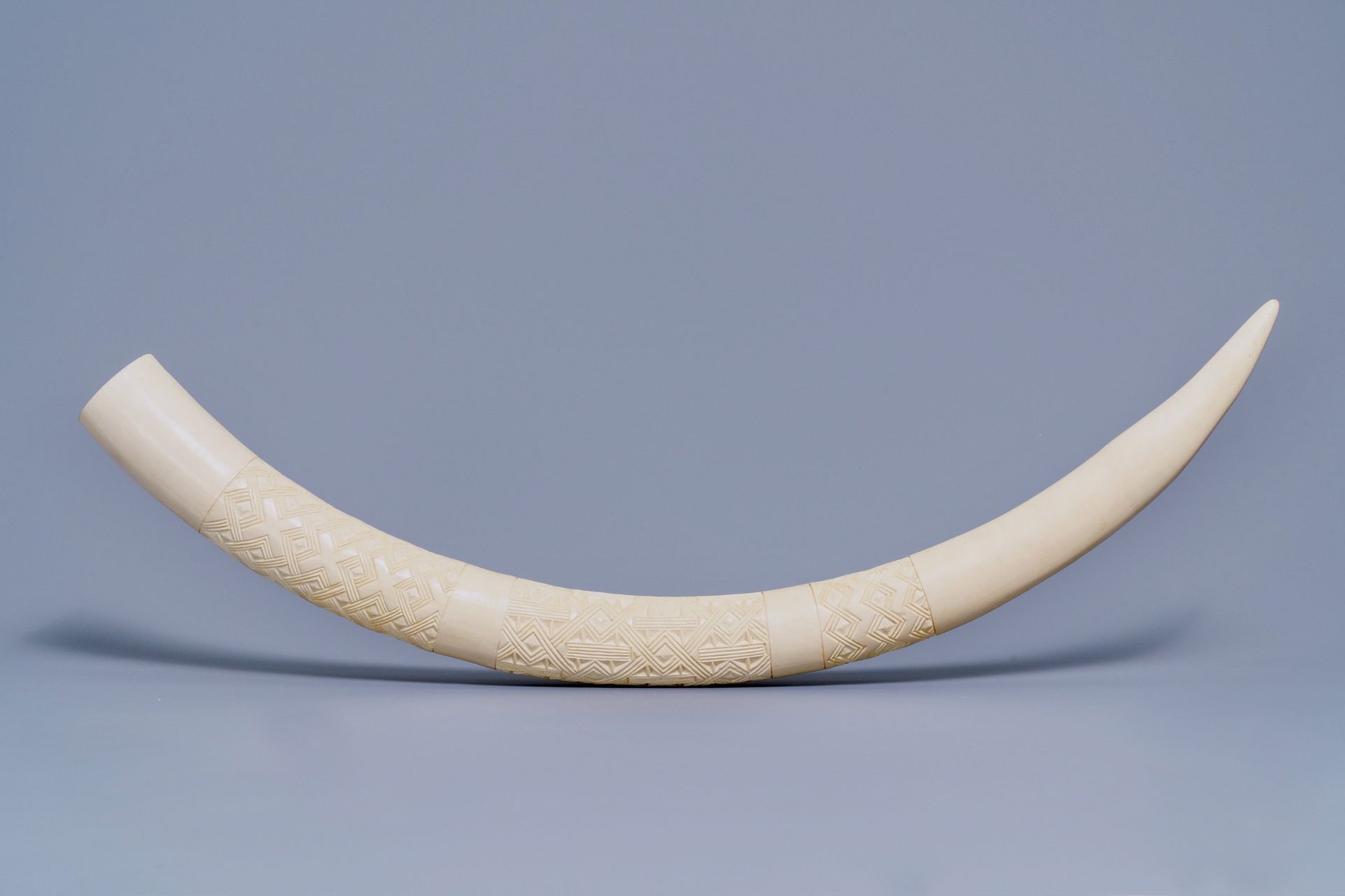 A carved ivory tusk with ornamental design, first half 20th C.