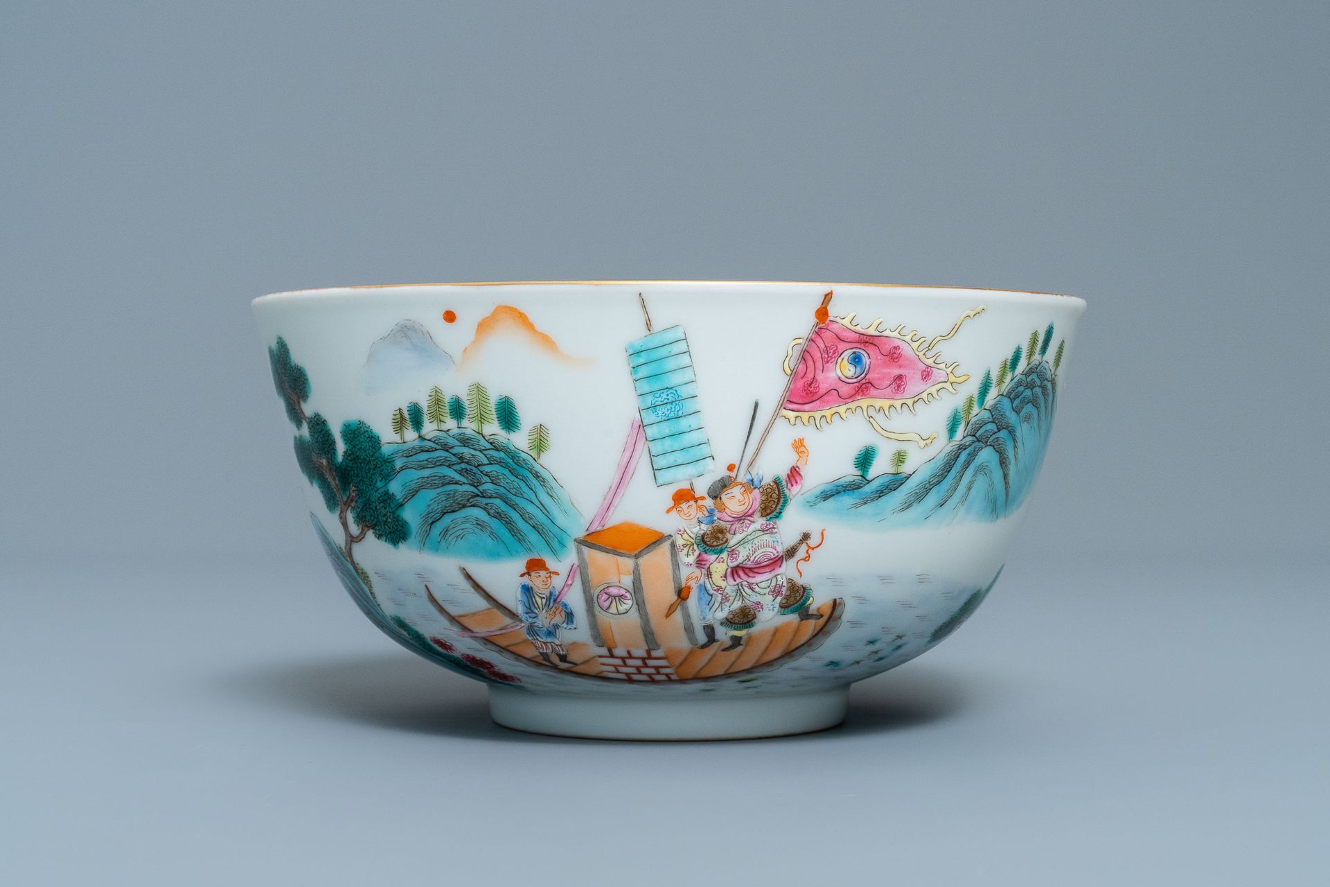 A fine Chinese famille rose bowl with figures in a river landscape, Qianlong mark, 20th C. - Image 4 of 7