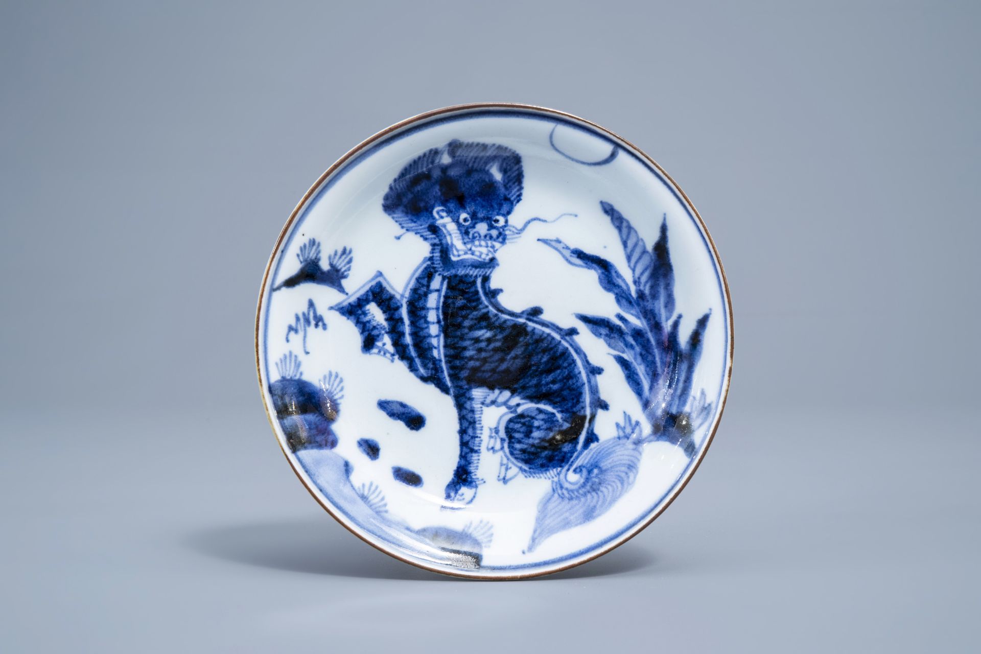 A pair of Japanese blue and white 'komainu' saucer dishes, marked, Edo, 18th C. - Image 4 of 5