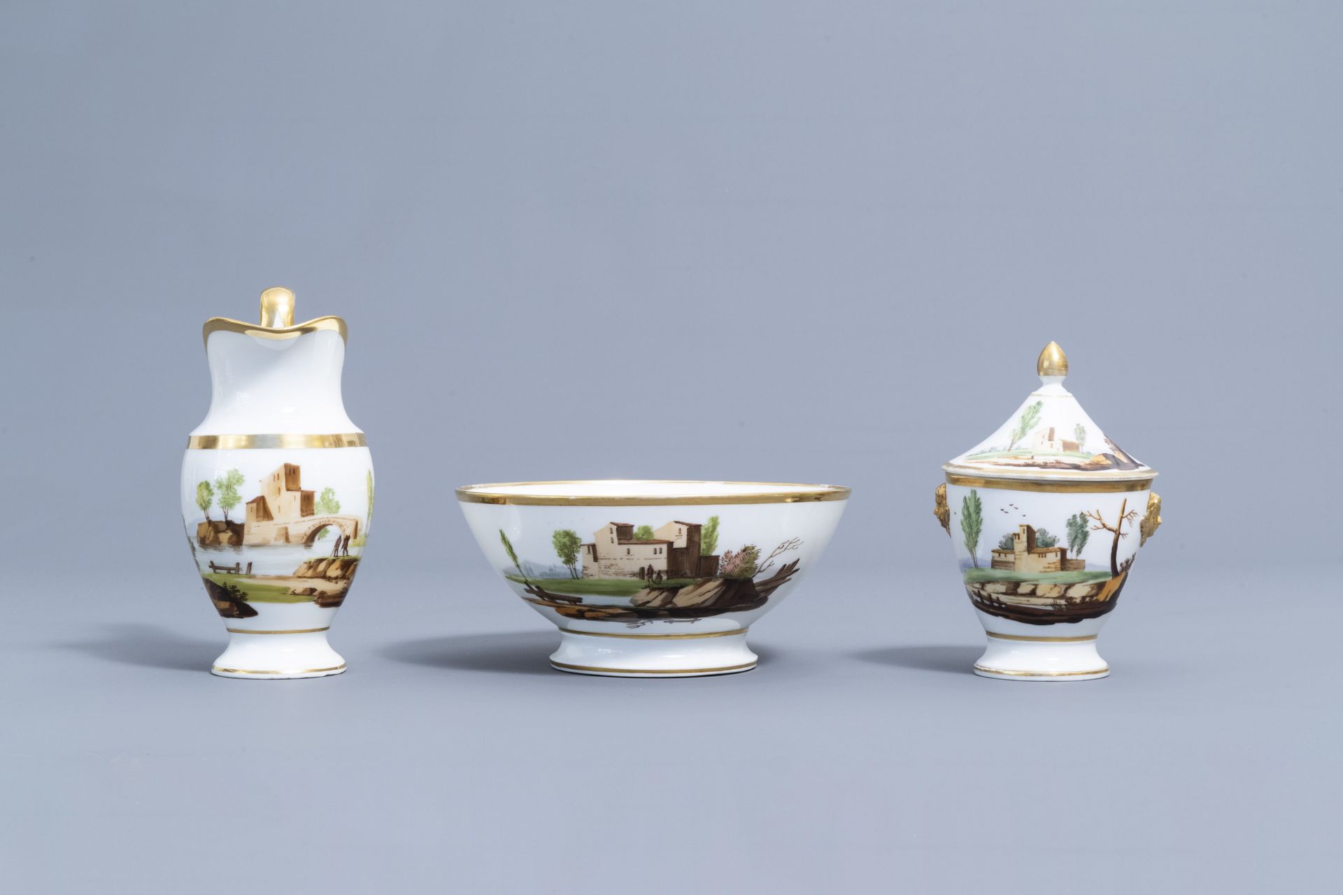 A 21-piece Paris polychrome and gilt porcelain coffee and tea service with landscapes, 19th C. - Image 15 of 46